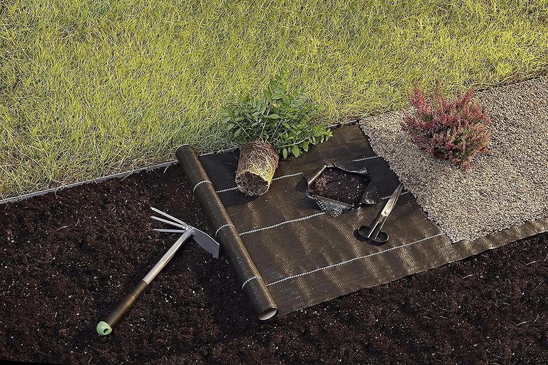 MIPATEX Woven Ground Cover being installed for garden and landscape weed control.